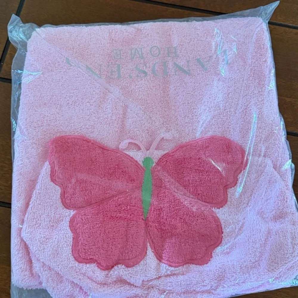 Pink hooded baby towel with a butterfly design. Land’s End